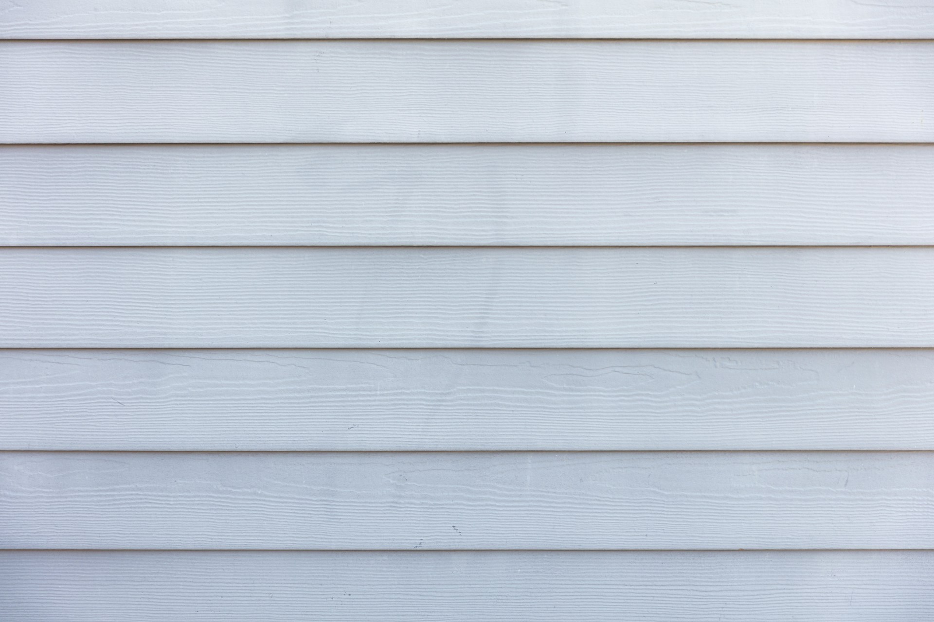 jon moore ZjqUTyTkE unsplash | RAINTITE Roofing & Construction siding