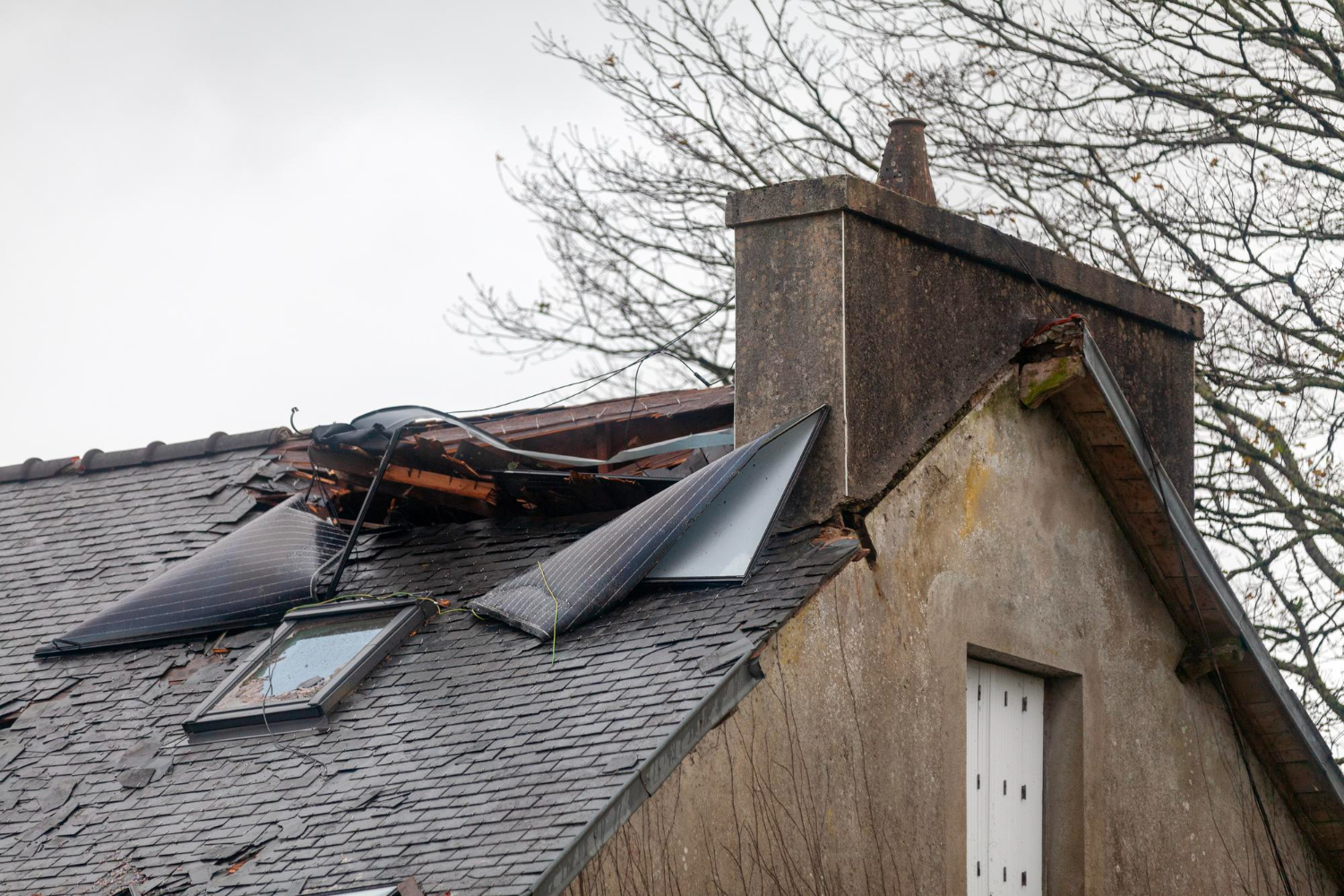 Storm-Damaged Roof | RAINTITE Roofing & Construction Storm-Damaged Roof